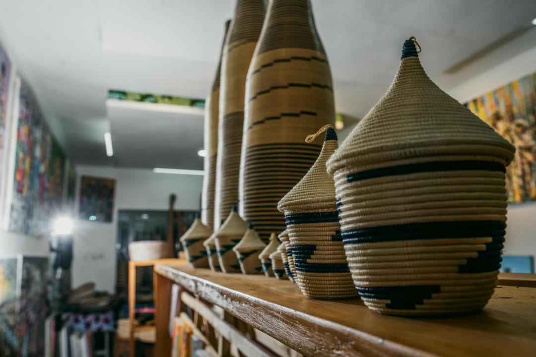 Hand-woven baskets of every size, lined up on our shop shelves.